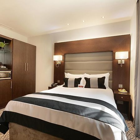 Park Grand London Lancaster Gate Hotell Exteriör bild A bedroom at the hotel