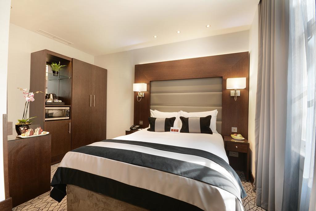 Park Grand London Lancaster Gate Hotell Exteriör bild A bedroom at the hotel